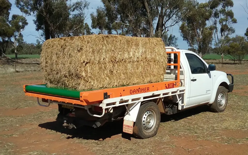 Single-length Daniher Bale Feeder mounted on a ute tray